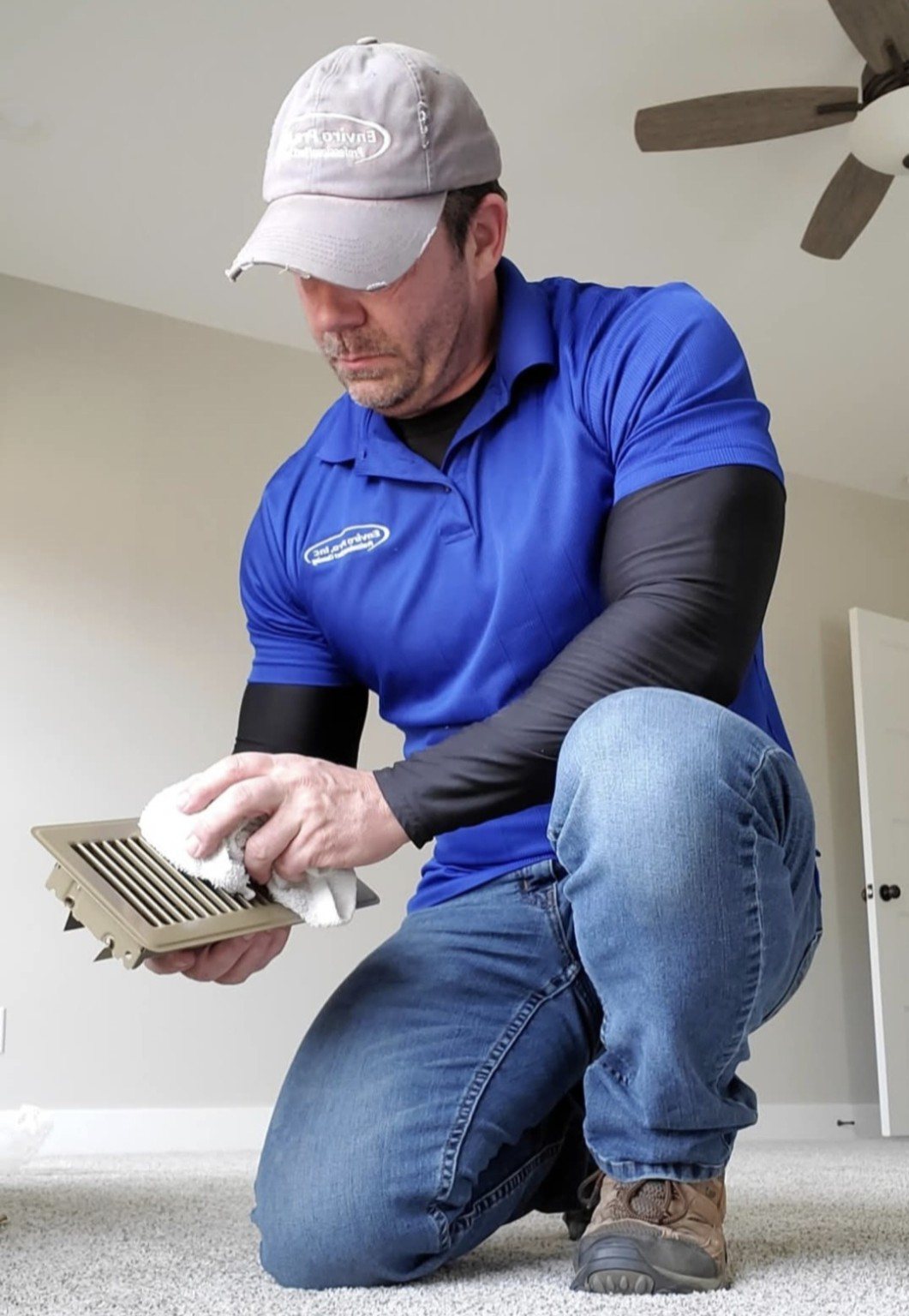 Accessible register being wiped with an all-natural antimicrobial disinfectant